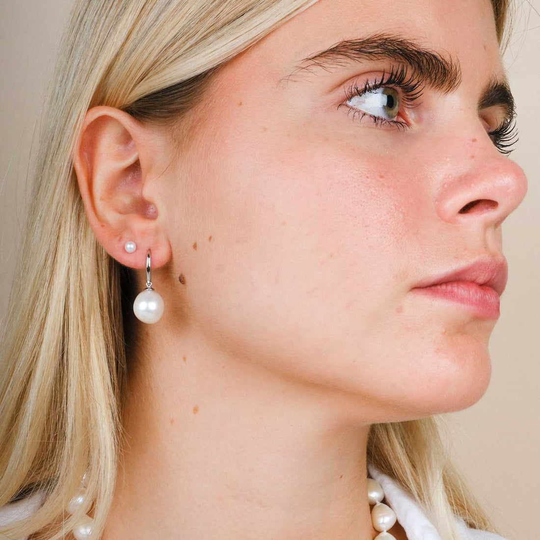 White Pearl Silver Hook Earrings at ethical jeweller E.C.one London