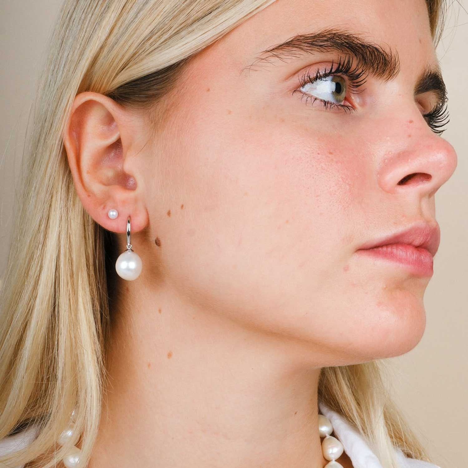 White Pearl Silver Hook Earrings at ethical jeweller E.C.one London