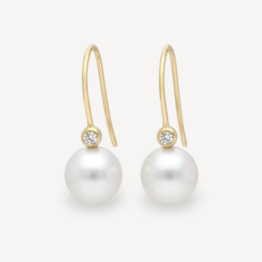 White Pearl and Diamond Gold Hook Earrings at ethical jeweller E.C.One London