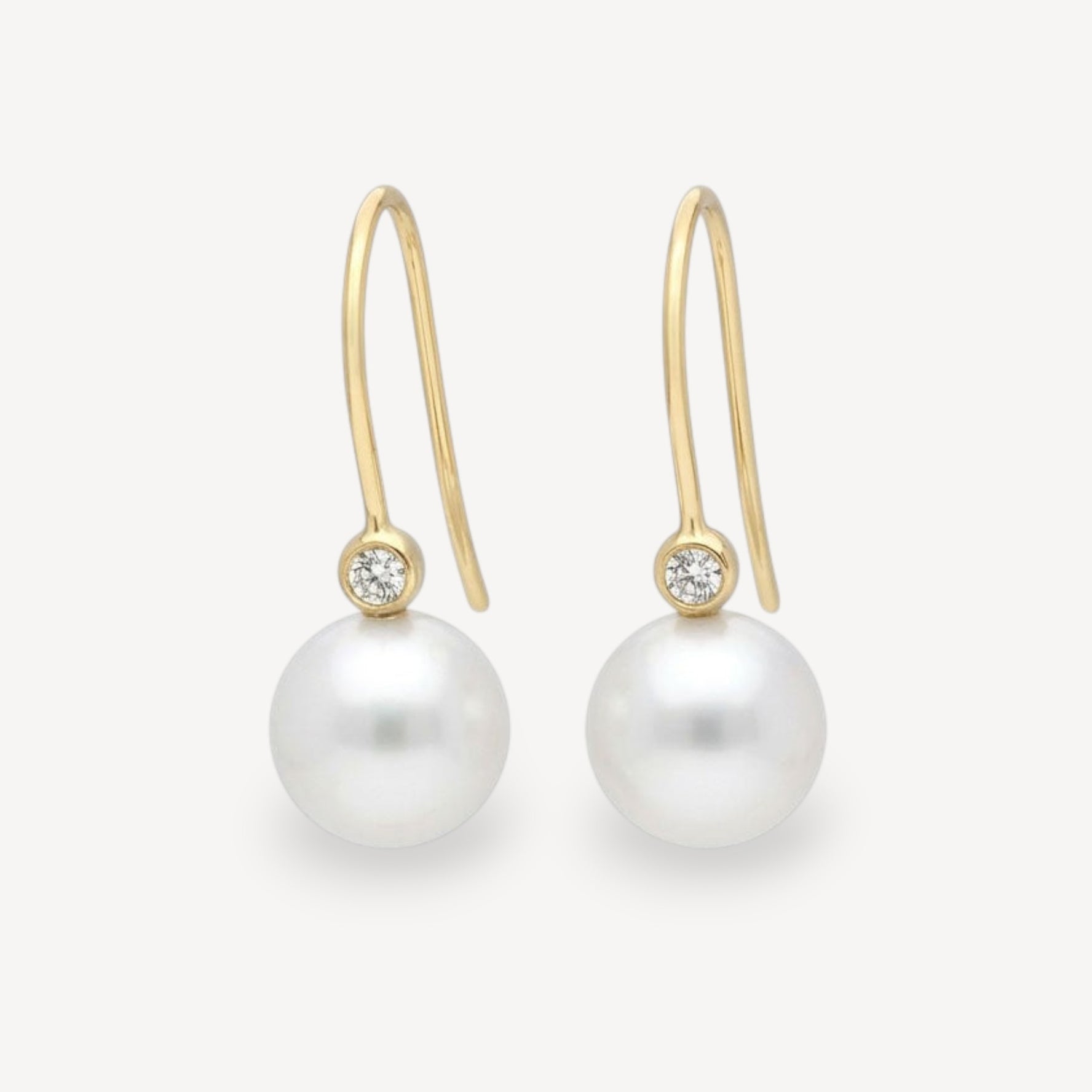 White Pearl and Diamond Gold Hook Earrings at ethical jeweller E.C.One London