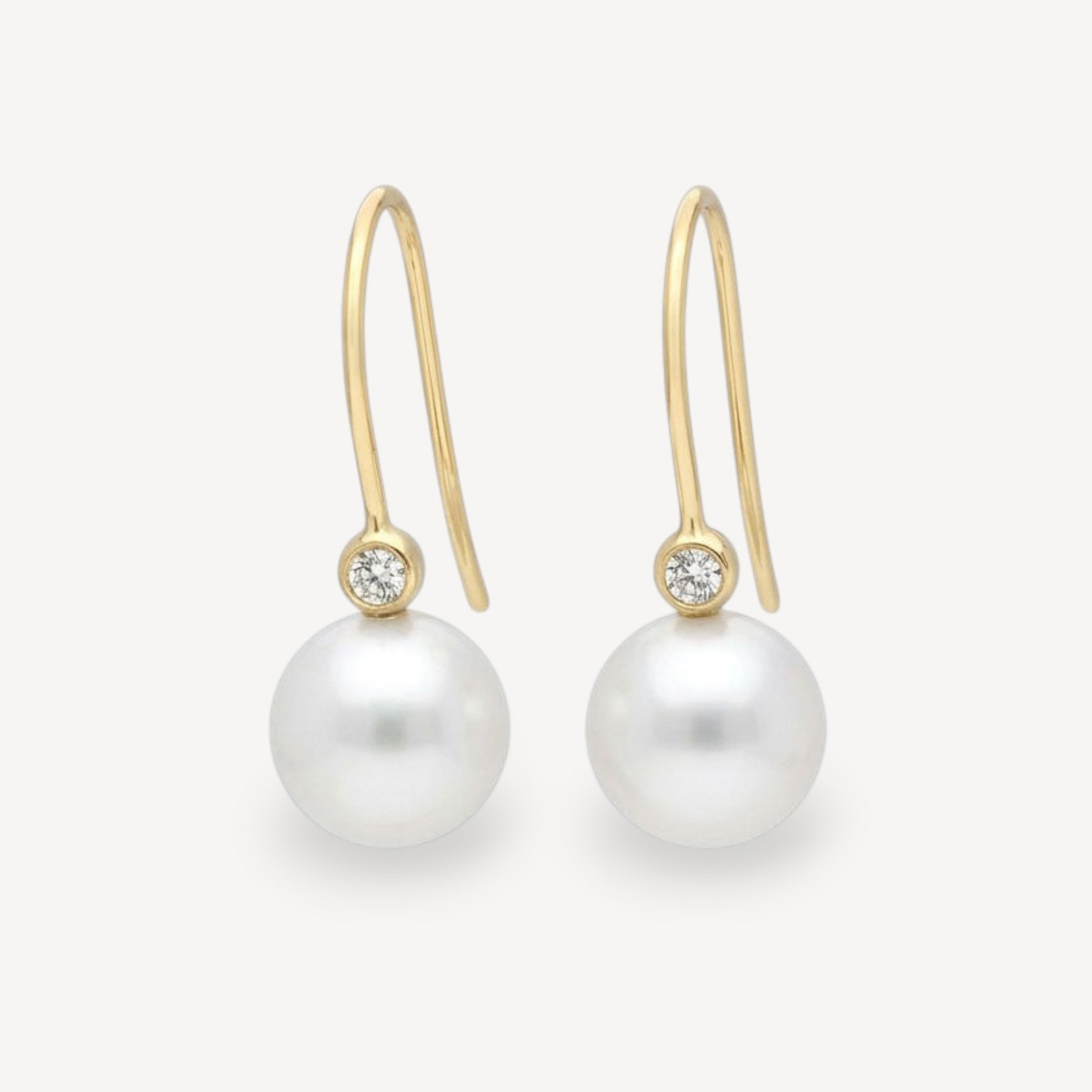 White Pearl and Diamond Gold Hook Earrings at ethical jeweller E.C.One London