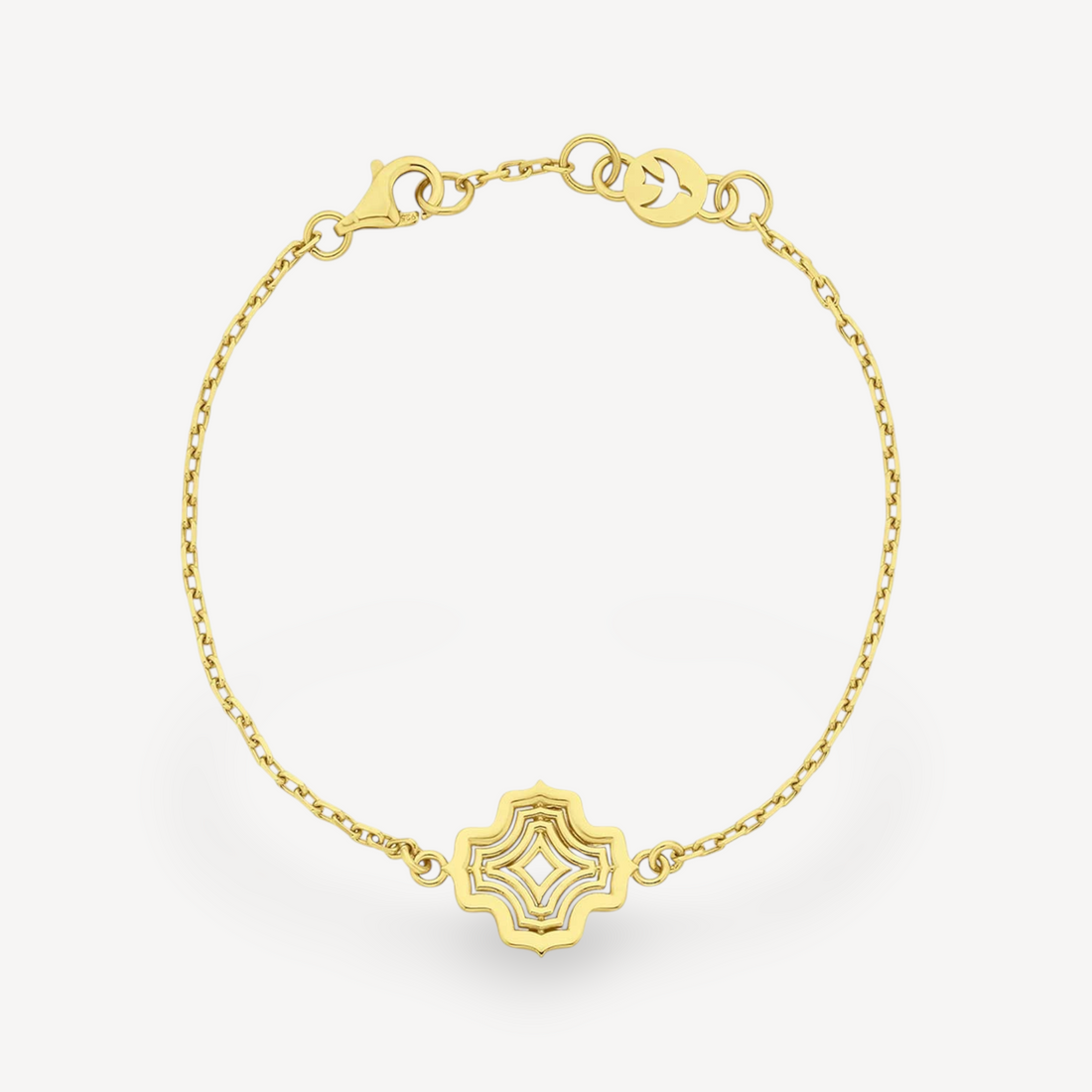EC One ALMA gold plated bracelet featuring a delicate chain and a central geometric quatrefoil charm.