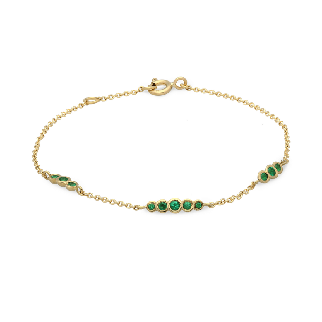 EC One's Dainty Emerald and recycled yellow gold bracelet hand made in our  London B Corp workshop