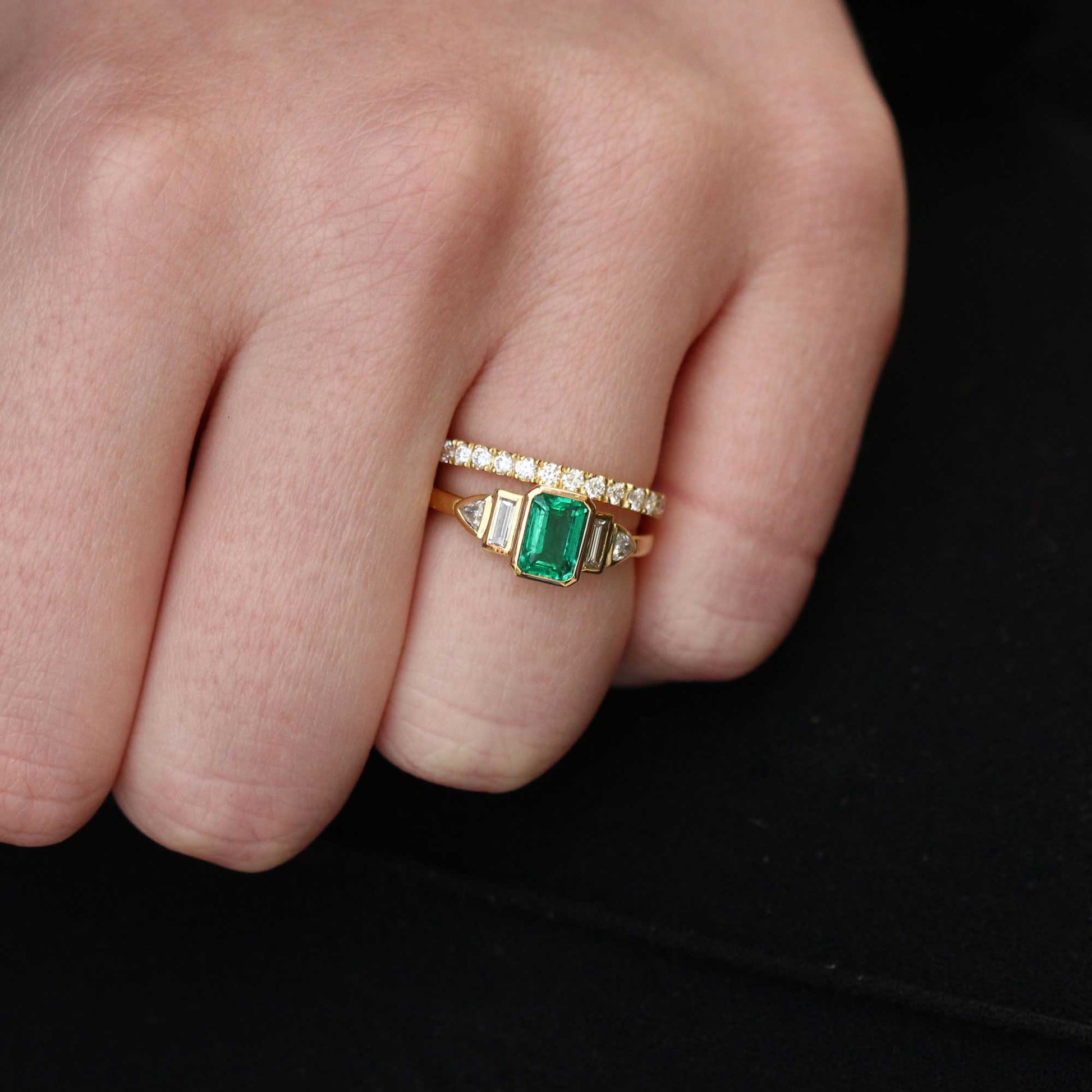Daphne deco inspired emerald and diamond engagement ring in recycled yellow gold by EC One London