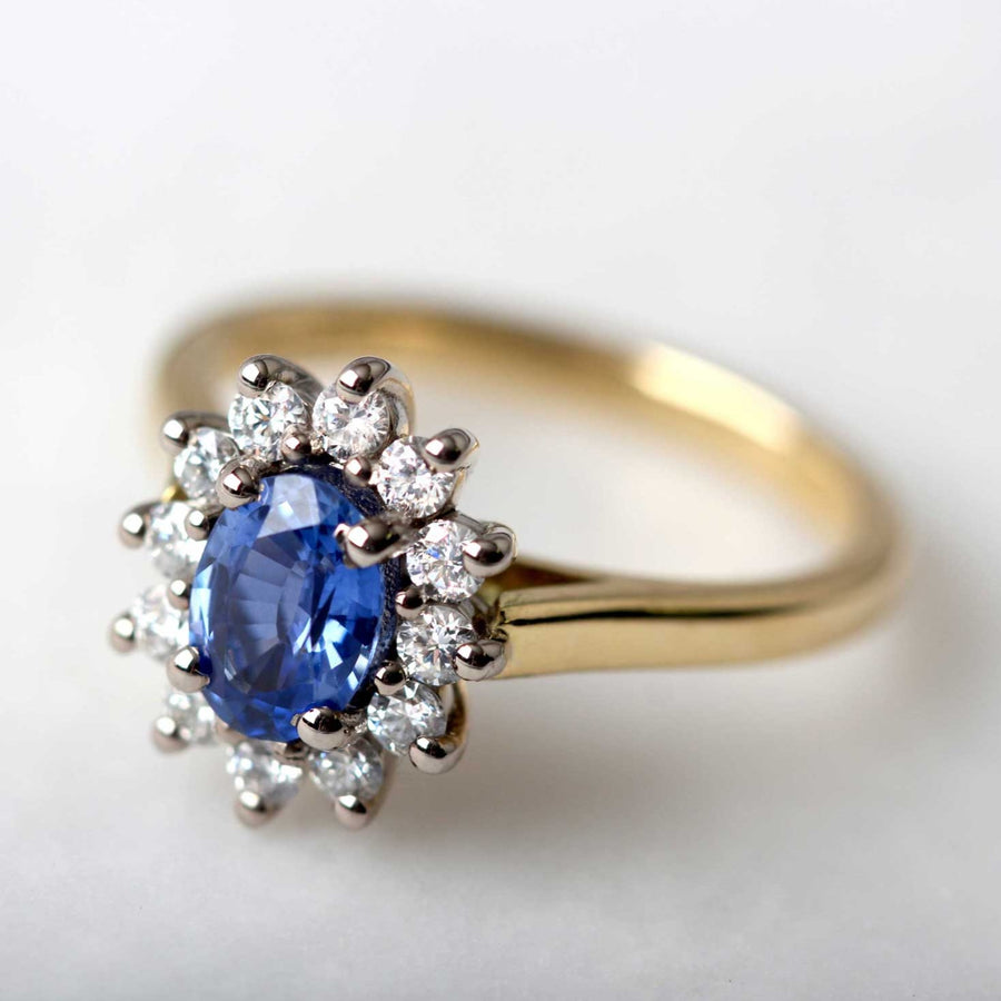 EC One Florence Engagement ring with blue sapphire and white diamonds in recycled yellow gold made in our B Corp London workshop