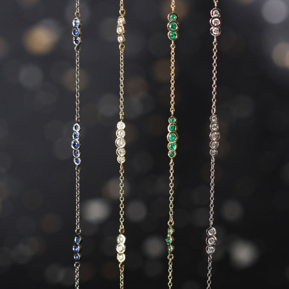 EC One's Dainty Emerald and recycled yellow gold bracelet hand made in our London B Corp workshop