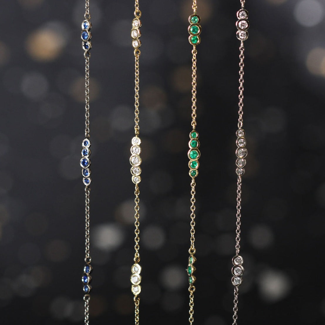 EC One's Dainty Emerald and recycled yellow gold bracelet hand made in our London B Corp workshop