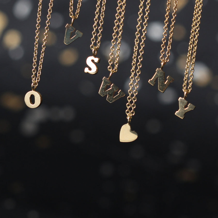 EC One mini initial and heart gold necklaces