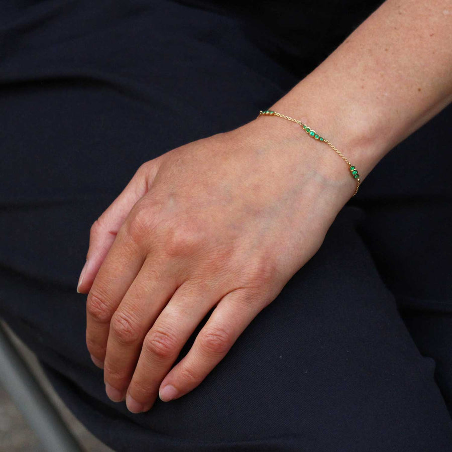 EC One's Dainty Emerald and recycled yellow gold bracelet hand made in our London B Corp workshop